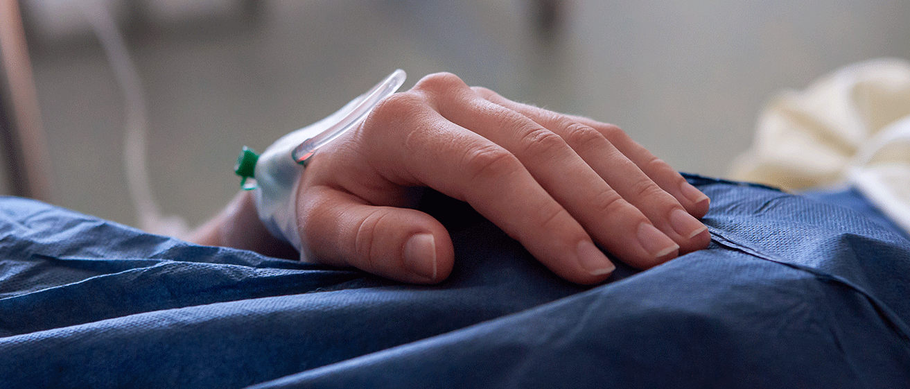 A patient undergoing recovery after surgery