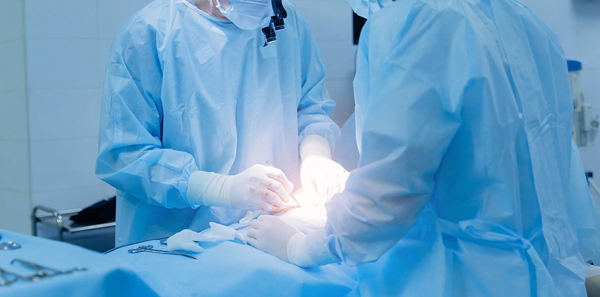 Surgeons performing hernia surgery